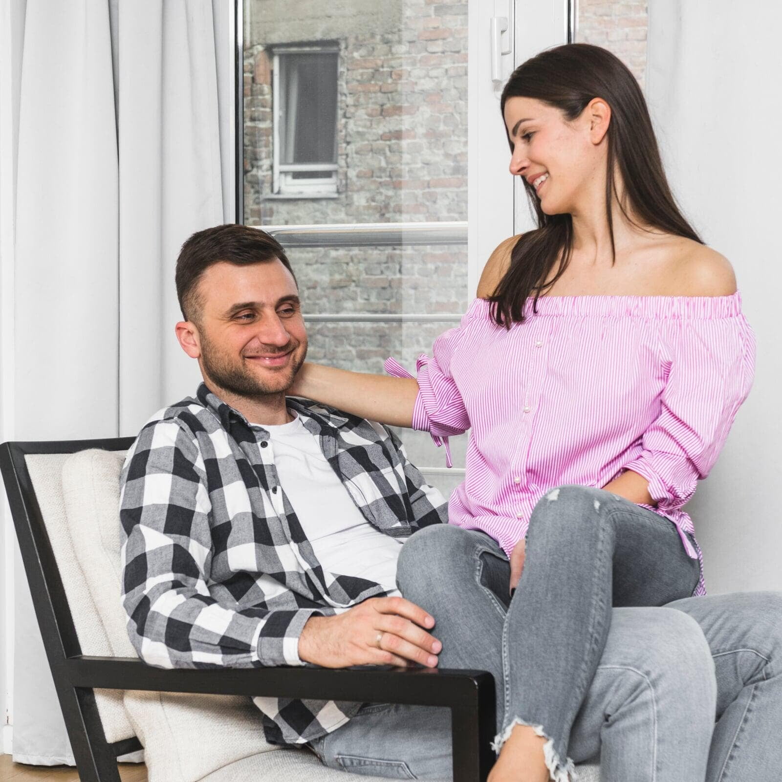 A couple sitting together, calm and connected